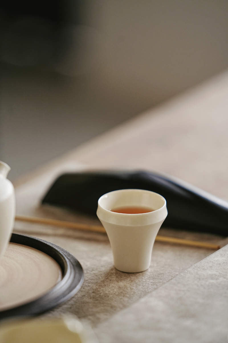 Elegant Tall White Fold Cup