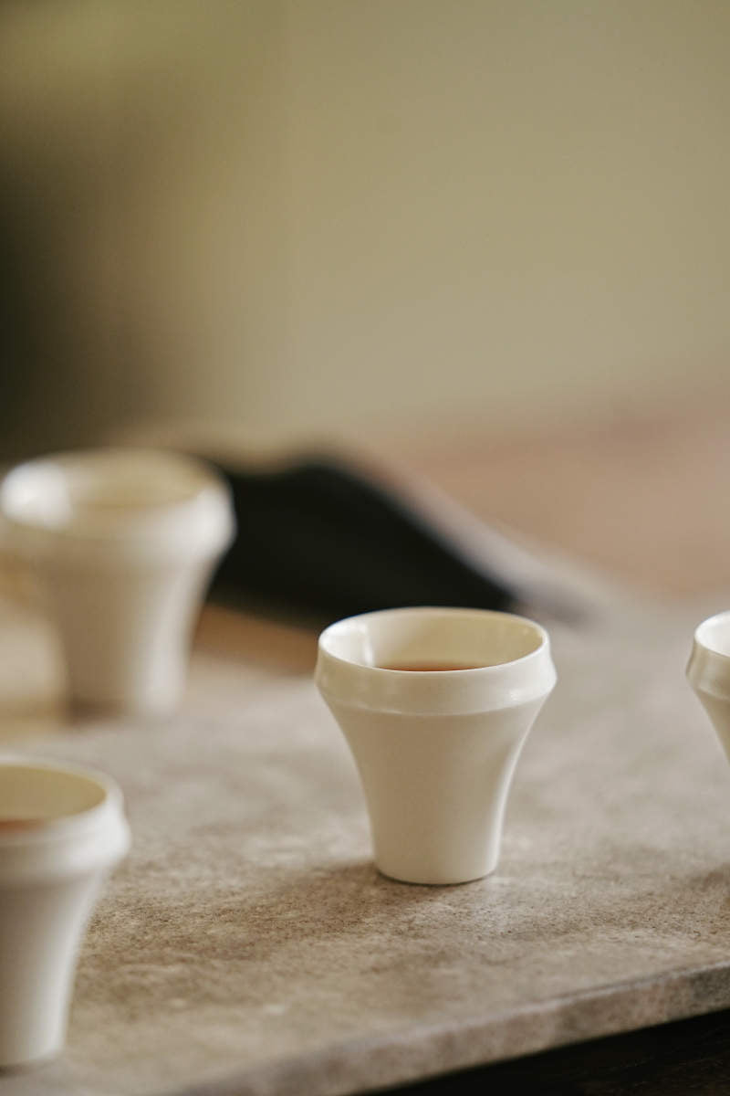 Elegant Tall White Fold Cup