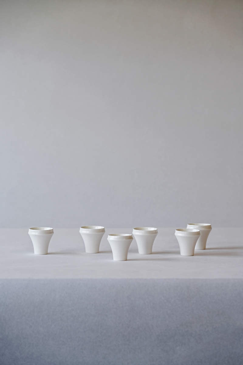 Elegant Tall White Fold Cup