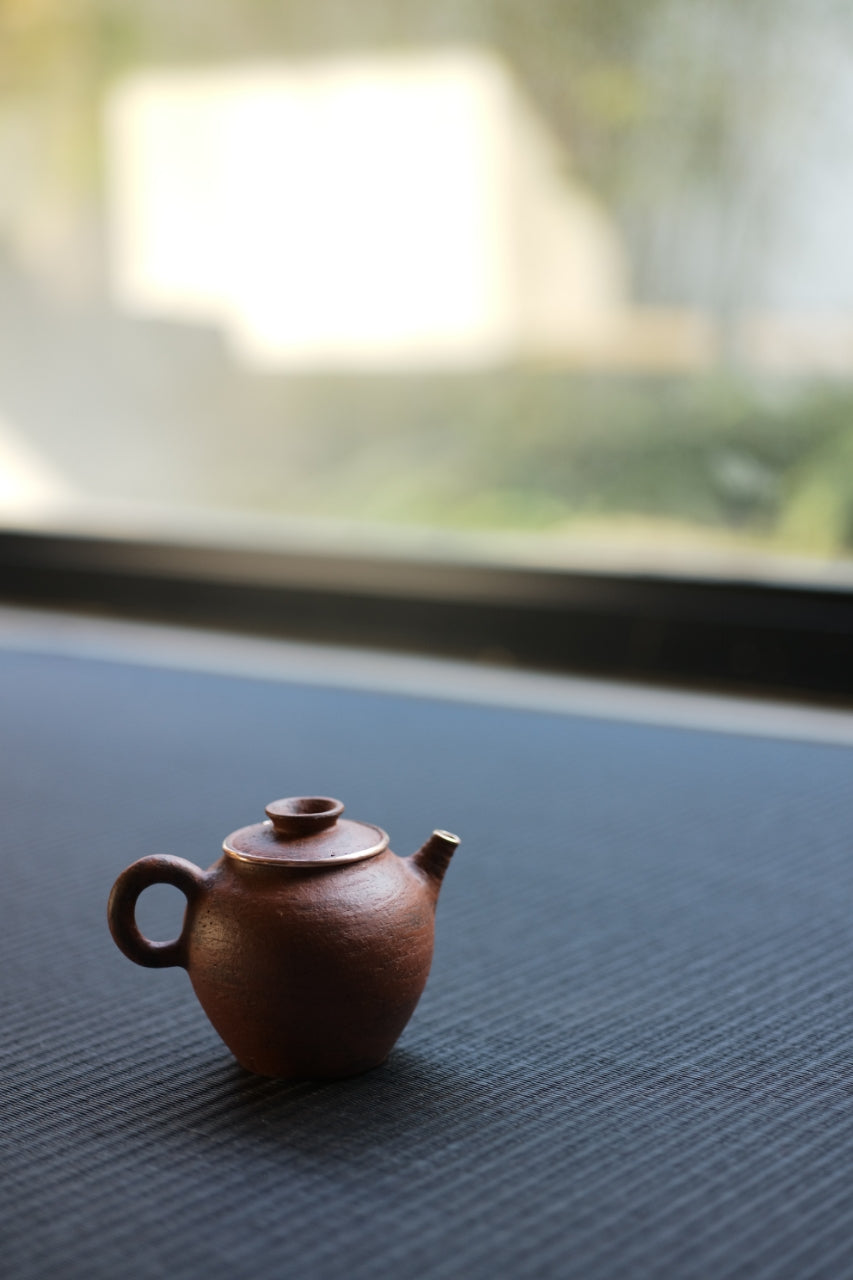Hui Shan Calligraphy and Copper Teapot by Chengwei