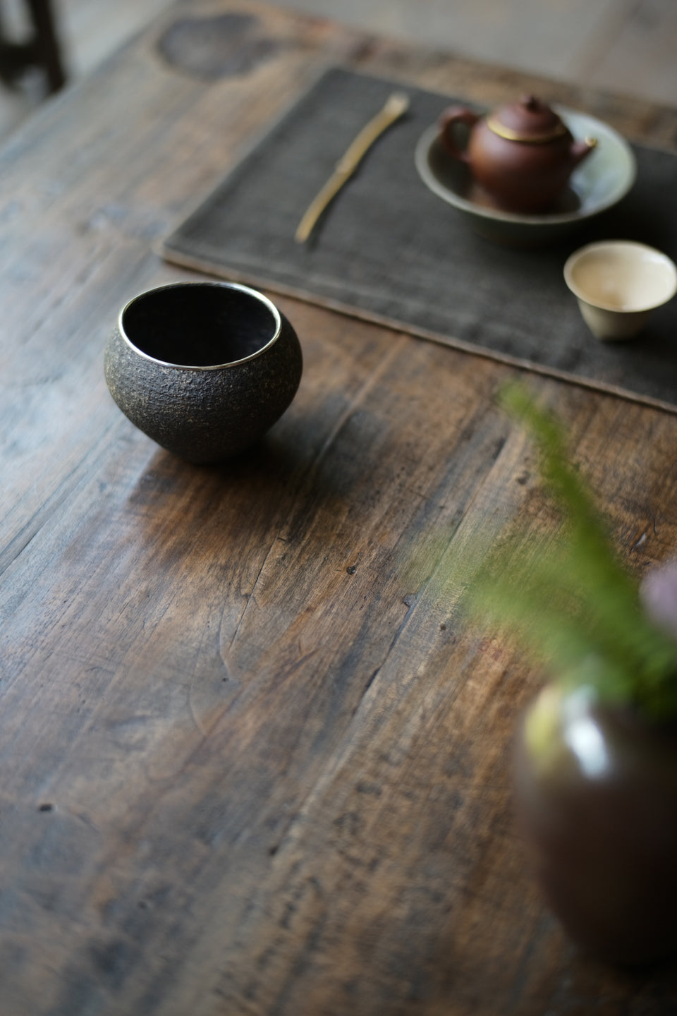 Natural Earth "Enso" Jianshui with Silver Rim
