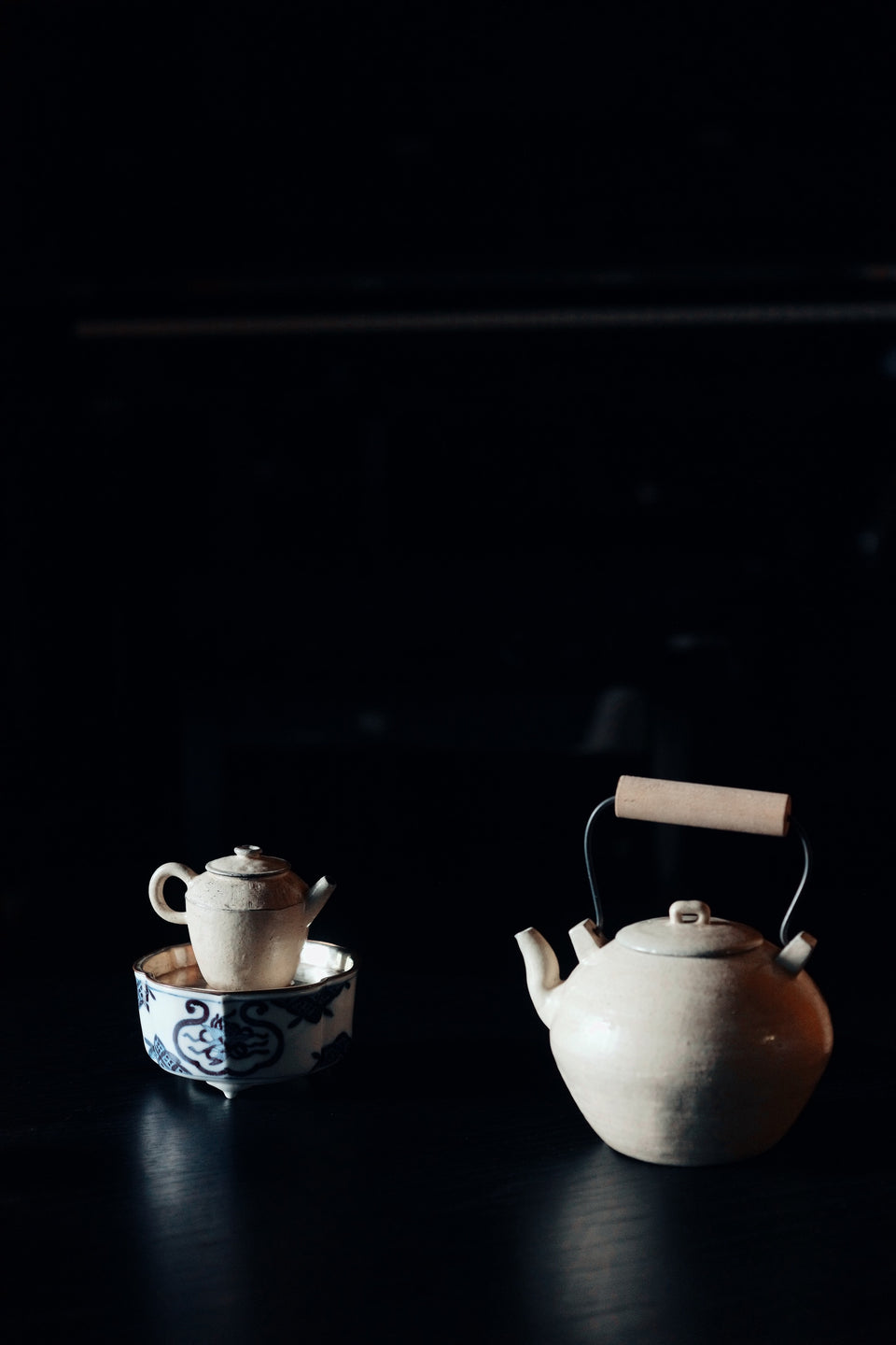 Wood-Handled White Powder Glaze Clay Tea Kettle