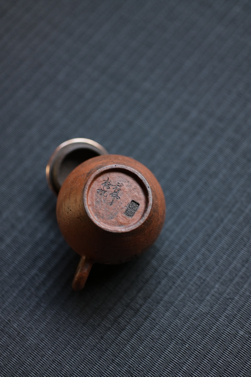 Hui Shan Calligraphy and Copper Teapot by Chengwei