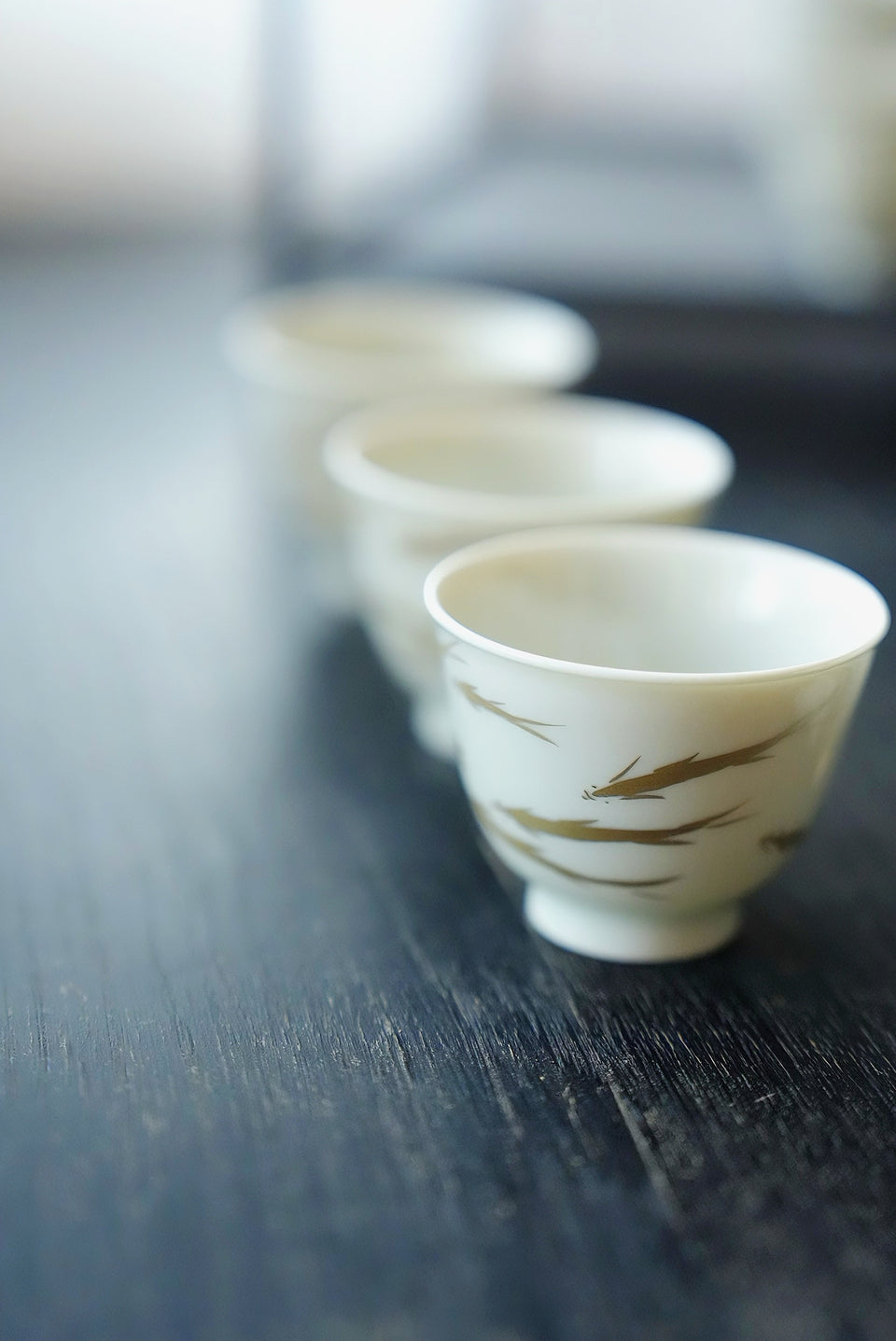 Gold School of Fish Teacup Set