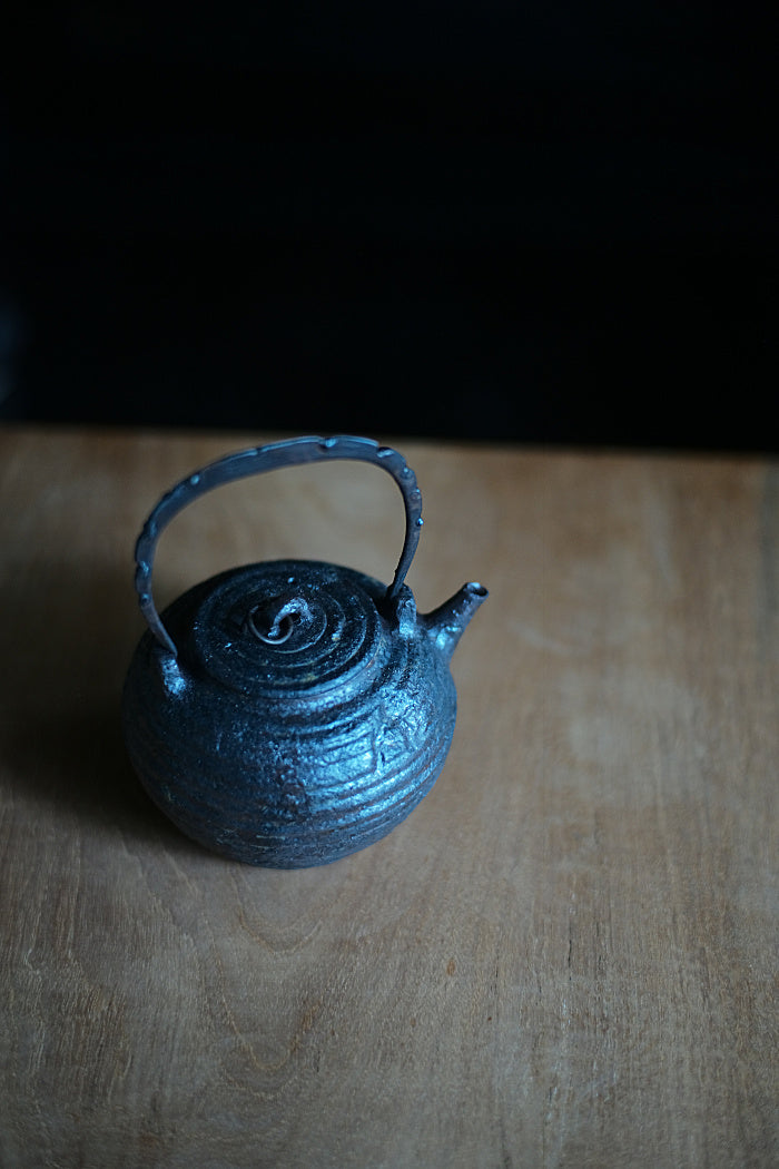 Tattered Kettle with Iron Handle