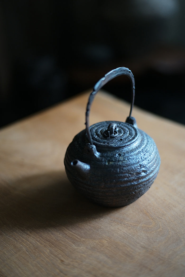 Tattered Kettle with Iron Handle