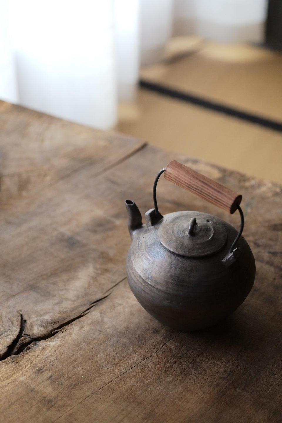 Wood-Handled Ceramic Kettle With Metal Glaze