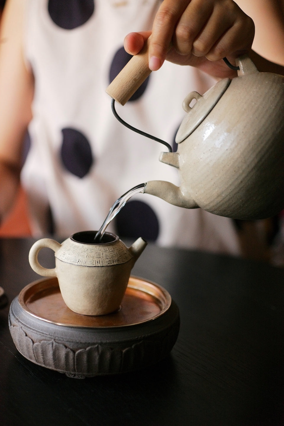 Hand-made white powder-glazed teapot with geometric patterns